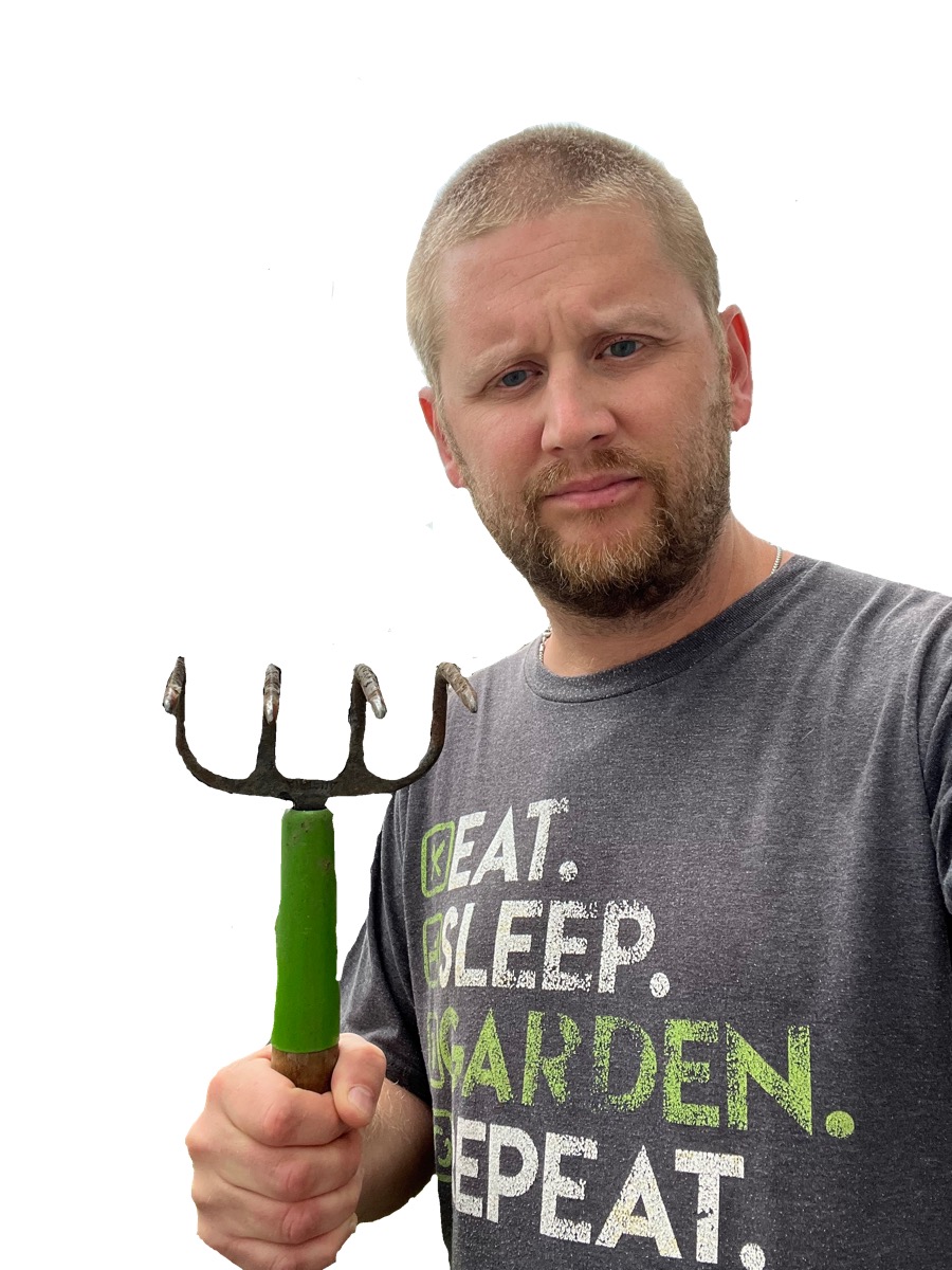 Matt The Garden Guy holding a garden fork